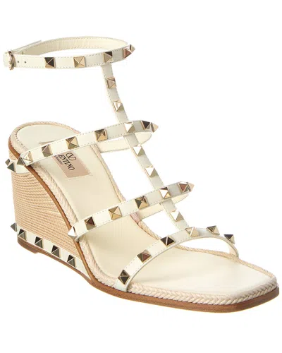 Shop Valentino Rockstud Caged 90 Leather Ankle Strap Wedge Sandal In White