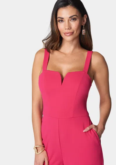 Shop Bebe V Wire Core Jumpsuit In Pink
