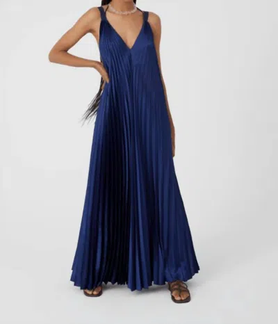 Shop Beatrice B Long Pleated Satin Dress In Dark Indigo In Blue