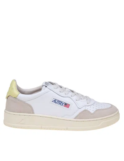 Shop Autry Leather And Suede Sneakers In White/yellow
