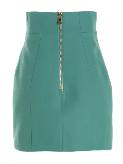 Shop Balmain Button-embossed Wool Mini Skirt In Green