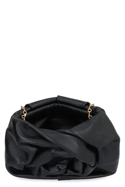 Shop Burberry Rose Leather Clutch In Black