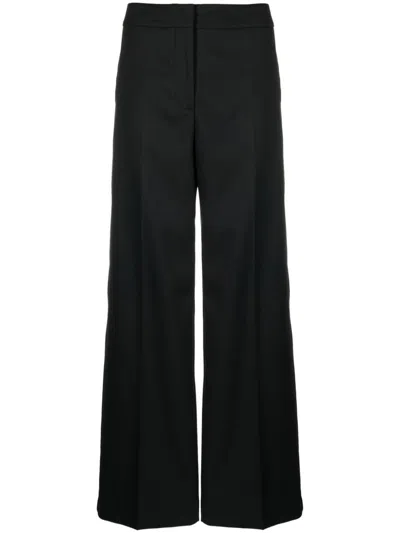 Shop Calvin Klein Trousers In Black