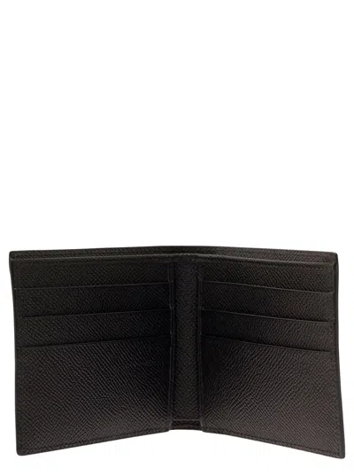Shop Dolce & Gabbana Black Bi-fold Wallet With All-over Dg Logo Print In Grainy Leather Man