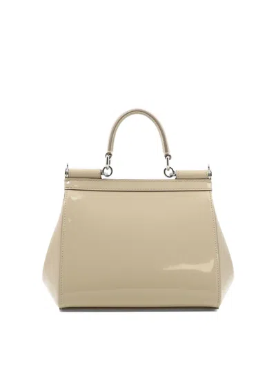 Shop Dolce & Gabbana Handbags. In Beige O Tan