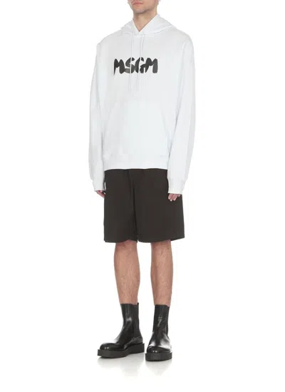 Shop Msgm Logo Print Hoodie In White/black
