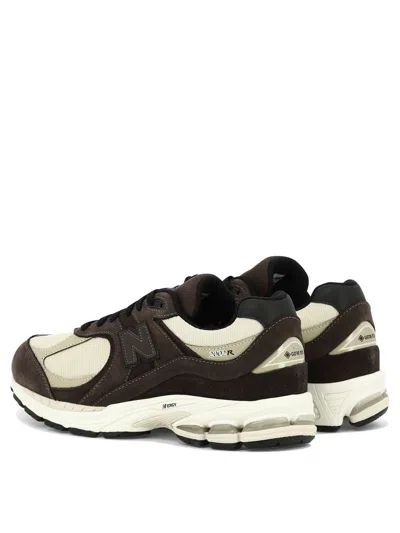 Shop New Balance 2002 In Brown