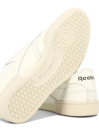 Shop Reebok Sneakers In White
