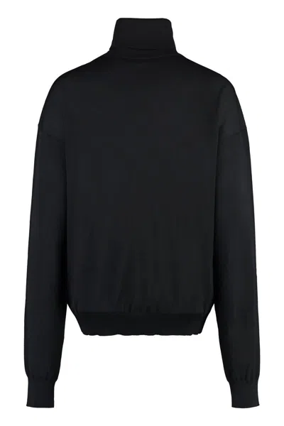Shop Saint Laurent Turtleneck Wool Pullover In Black