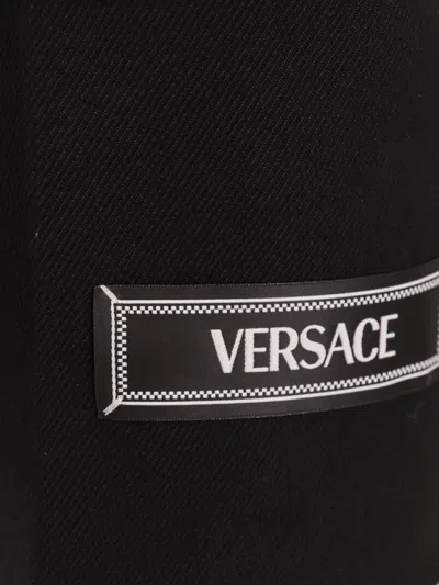 Shop Versace Double-breasted Wool Blazer In Black
