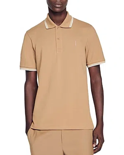 Shop Sandro Vertical Logo Polo Shirt In Brown