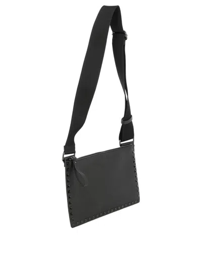Shop Valentino Garavani "rockstud Flat" Crossbody Bag In Black