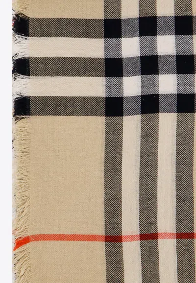 Shop Burberry Checked Wool Scarf In Beige