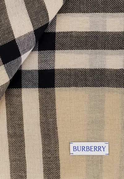 Shop Burberry Checked Wool Scarf In Beige