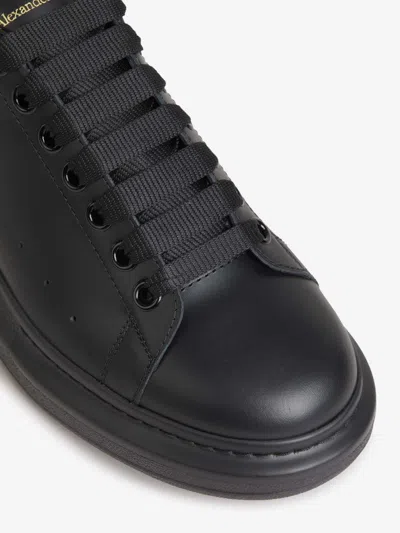 Shop Alexander Mcqueen Leather Oversized Sneakers In Black