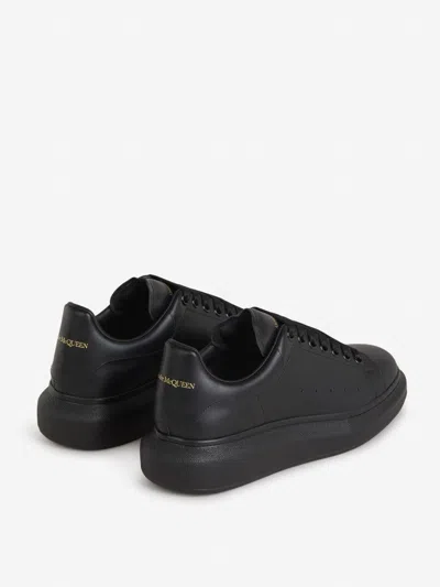 Shop Alexander Mcqueen Leather Oversized Sneakers In Black