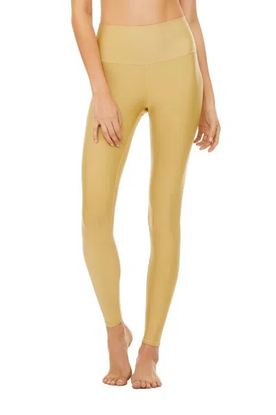 Shop Alo Yoga High Waisted Air Lift Legging In Honey In Yellow