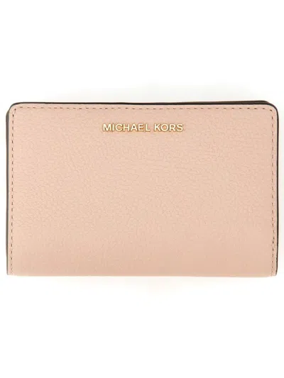Shop Michael Michael Kors Logo Lettering Bifold Wallet In Pink