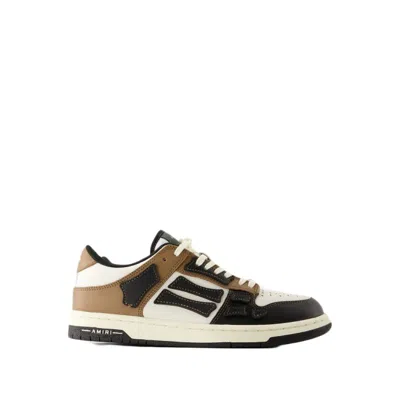 Shop Amiri Skel Top Low Sneakers - Leather - Black/brown
