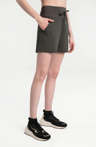 Shop Lole Momentum Drawstring Shorts In Olive