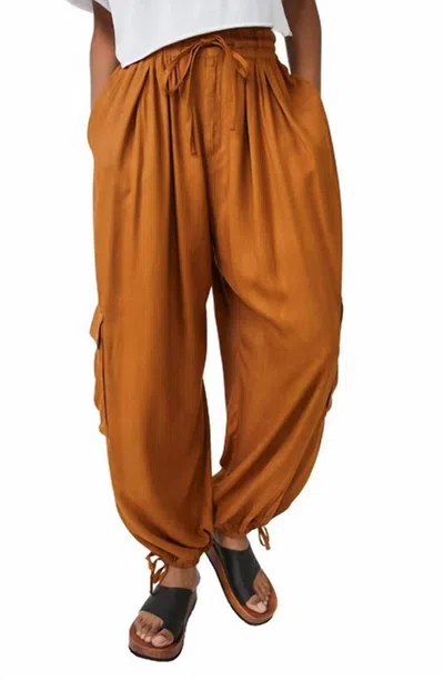 Shop Free People Palash Solid Cargo Pant In Goldenrod In Brown