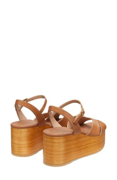 Shop Stuart Weitzman Carmen Midi Wedge Sandal In Tan/ Sand