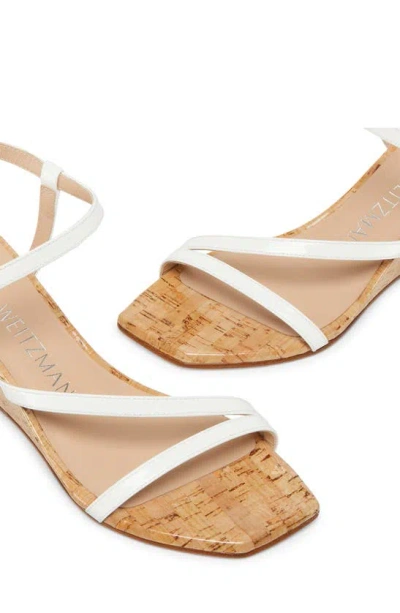 Stuart Weitzman Oasis Patent Ankle-strap Wedge Sandals In White.