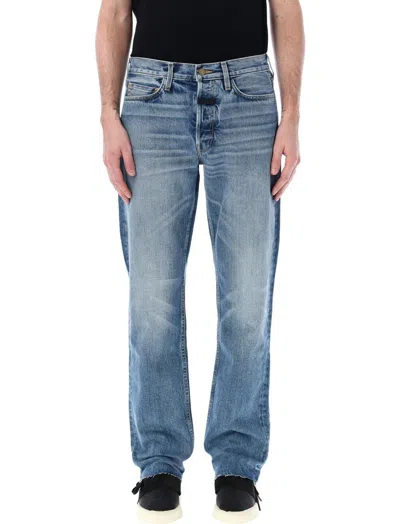 Shop Fear Of God Button Detailed Straight Leg Jeans In Blue