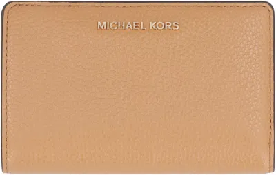 Shop Michael Michael Kors Logo Lettering Bifold Wallet In Beige