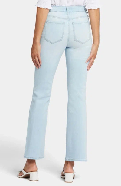 Shop Nydj Barbara Side Slit Bootcut Jeans In Oceanfront