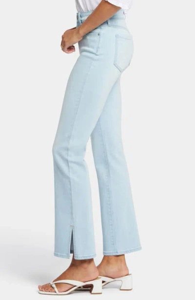 Shop Nydj Barbara Side Slit Bootcut Jeans In Oceanfront