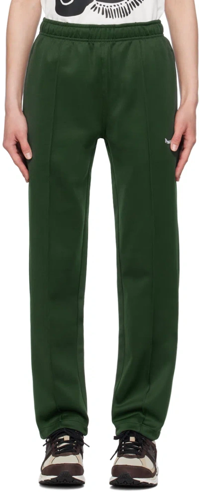 Shop Museum Of Peace And Quiet Green Warm Up Track Pants In Forest