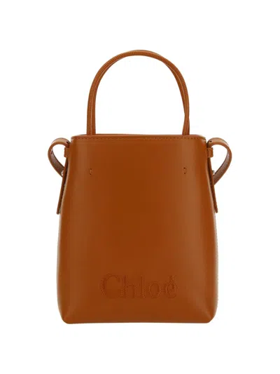Shop Chloé Bucket Bags In Caramel