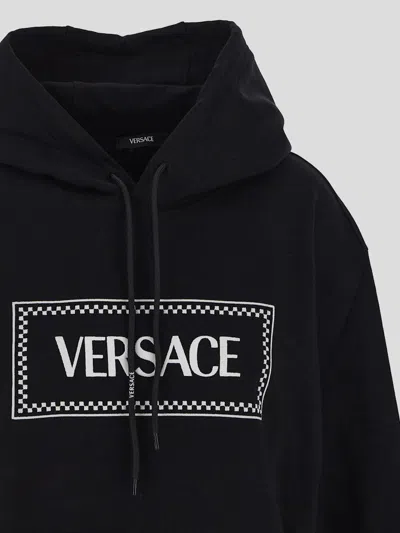 Shop Versace Embroidered Logo Hooded Sweatshirt In Black+white