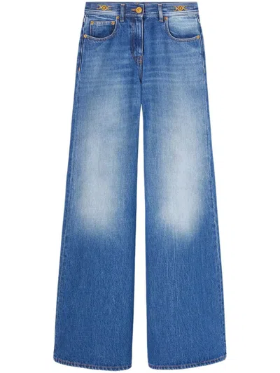 Shop Versace Wide Leg Denim Jeans In Blue