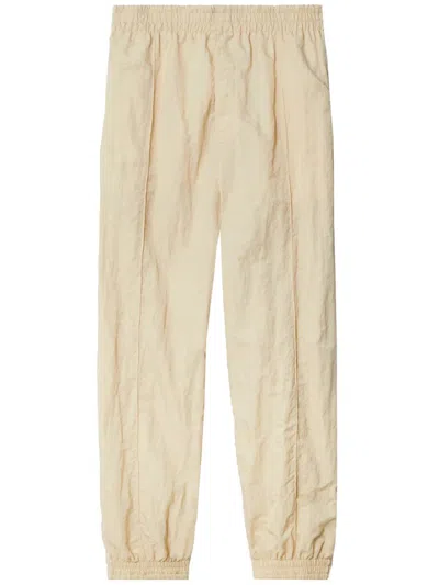 Shop Burberry Pants Clothing In Nude & Neutrals