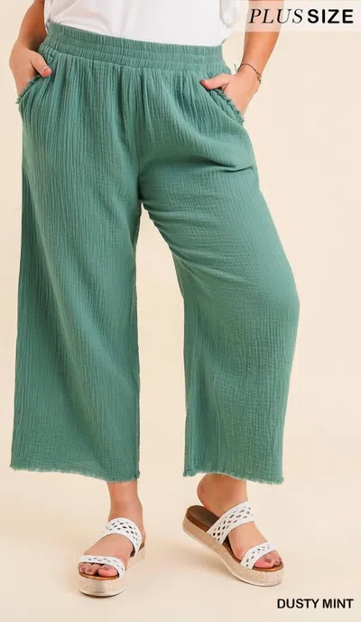 Shop Umgee Wide Leg Pants With Fray - Plus In Dusty Mint In Blue