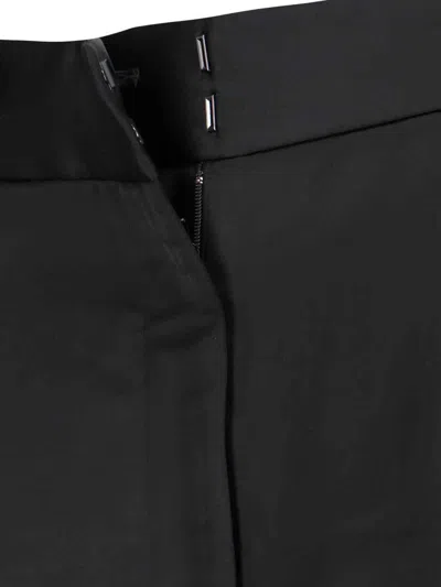 Shop Khaite Trousers In Black