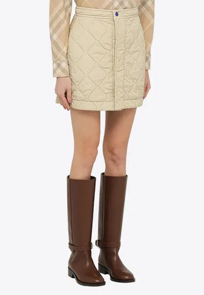 Shop Burberry A-line Quilted Mini Skirt In Beige