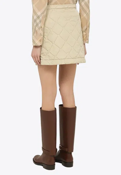Shop Burberry A-line Quilted Mini Skirt In Beige