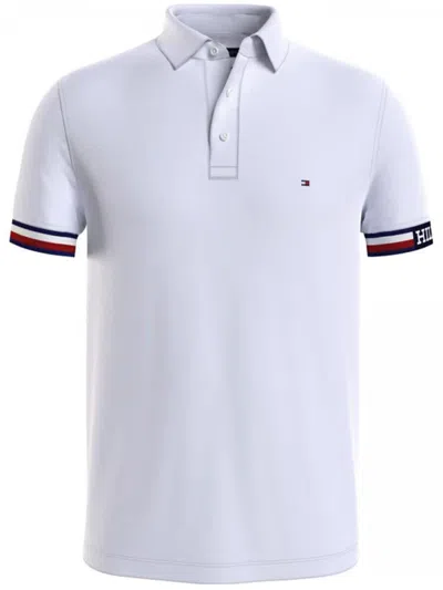 Shop Tommy Hilfiger Monotype Flag Flag Cuff Slim Fit Polo Shirt Clothing In White