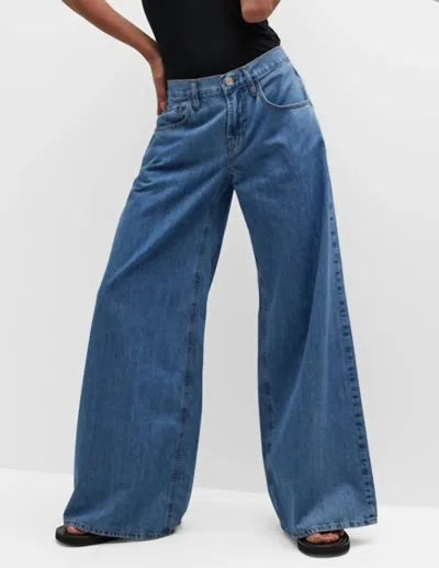 Shop Frame Le Mid Wide Leg Jeans In Happy Indigo In Multi