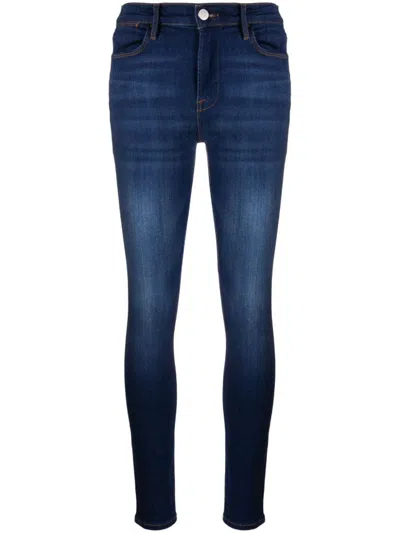 Shop Frame The High Skinny Clothing In Blue