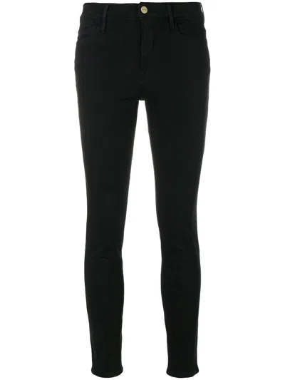 Shop Frame The High Skinny Clothing In Black