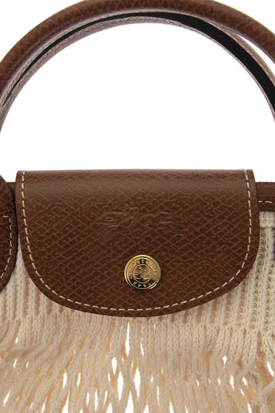 Shop Longchamp Le Pliage Filet - Top Handle Bag In Ecru