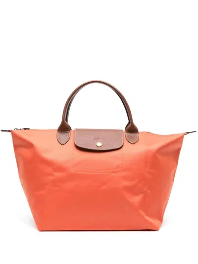 Shop Longchamp Le Pliage Original Bags In Yellow & Orange