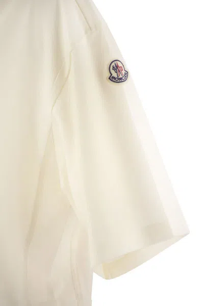 Shop Moncler Short-sleeved Polo Shirt In Natural