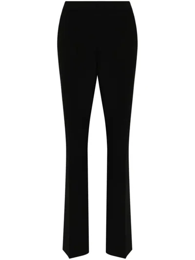 Shop Moschino Pants Clothing In Black