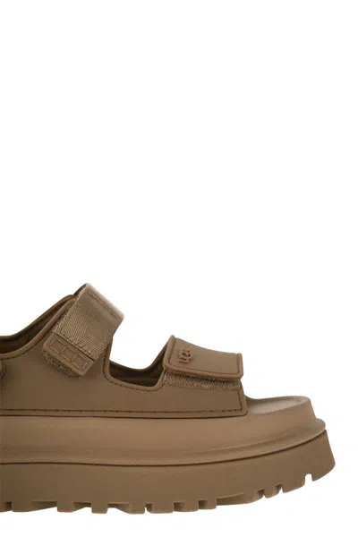 Shop Ugg Goldenglow - Adjustable Wedge Sandals In Brown