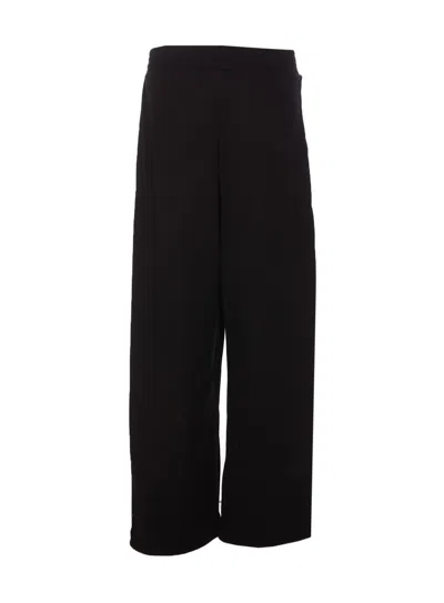 Shop Hinnominate Trousers In Black